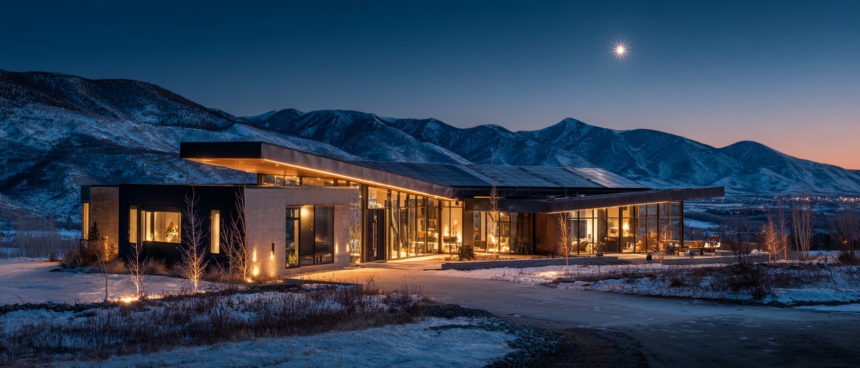 A modern Alberta home at dusk, rooftop solar glowing under a deep night sky.